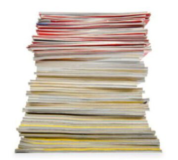 Stack of binders: symbolizes need for designing SEO content